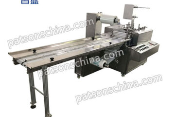 Four side seal glove packaging machine
