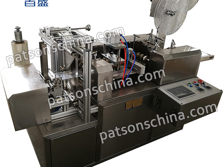Automatic surgical blade packaging machine with automatic feeder